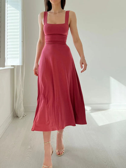 Robe Ksenia™ élégante avec poches intégrées pour un style moderne.